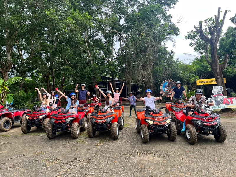 Group on Phuket ATV tour riding on jungle trail